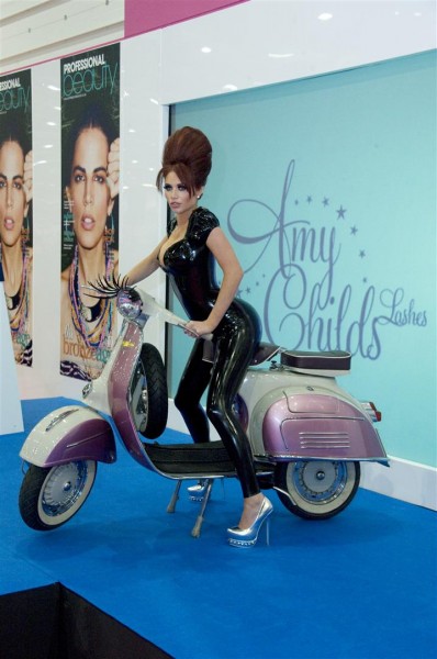 Amy Childs straddling an Italian