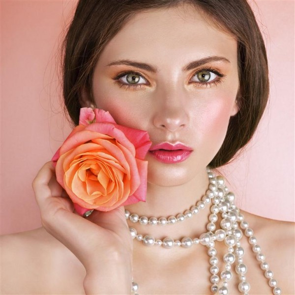 Model holding a rose