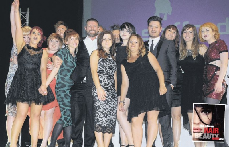 Hair Salon of the Year United Salons come up to receiving their award from Lee Stafford