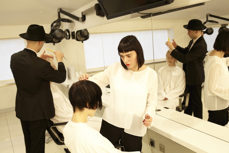 people learning to cut hair